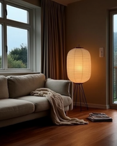 Floor lamps — the Tomo Lamp beside a sofa