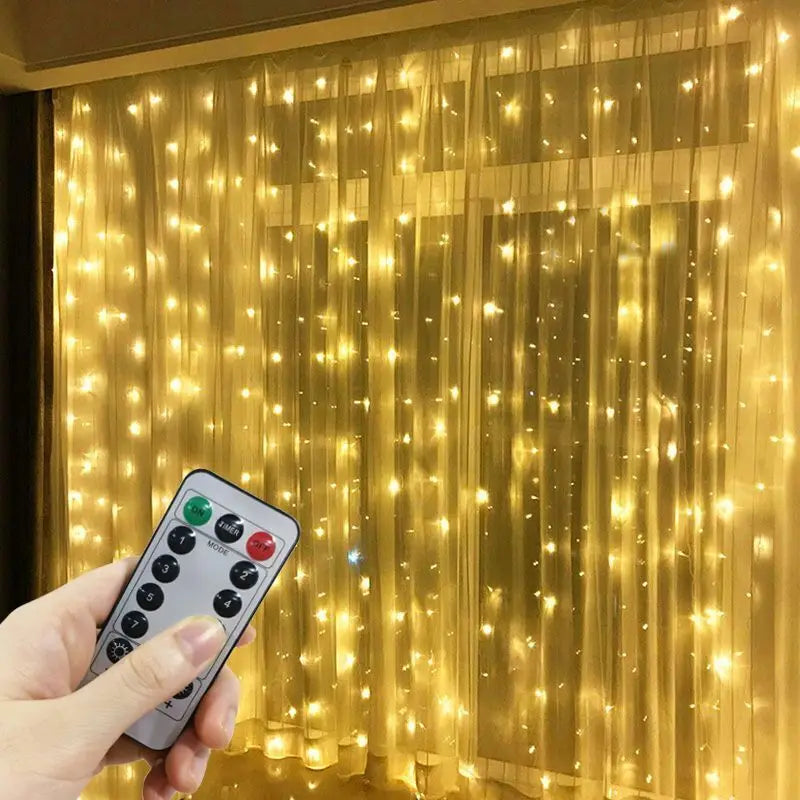 Warm fairy curtain lights across a bedroom wall
