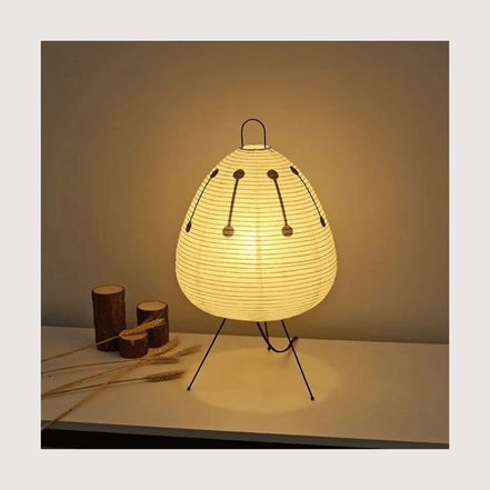 Paper lantern table lamp — standardized card on warm bone background
