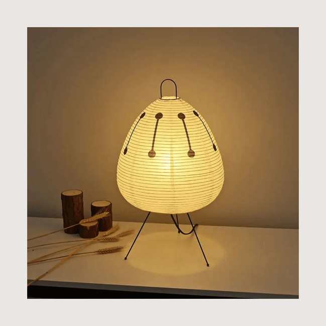 Paper lantern table lamp — standardized card on warm bone background
