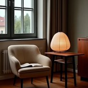 The Sora Lamp paper lantern on a side table