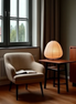 The Sora Lamp paper lantern on a side table