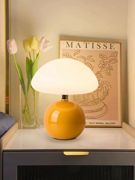 Bloom glass mushroom table lamp in butter yellow, glowing warm