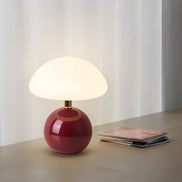 Bloom glass mushroom table lamp in terracotta red, glowing warm