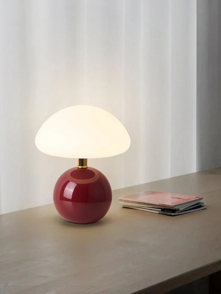 Bloom glass mushroom table lamp in terracotta red, glowing warm