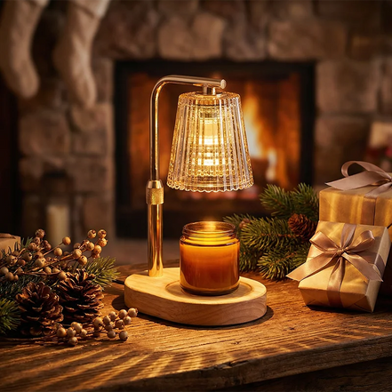Ember candle warmer lamp with amber fluted glass shade melting a jar candle on an oak base beside a fireplace