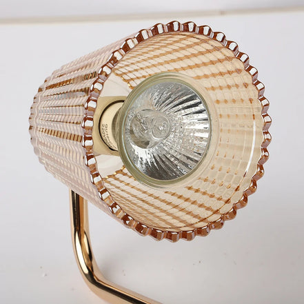 Ember candle warmer lamp in a cozy bedroom setting