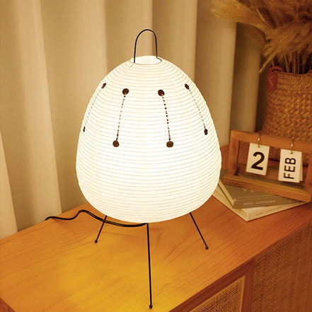 Paper lantern table lamp, medium size, glowing warm