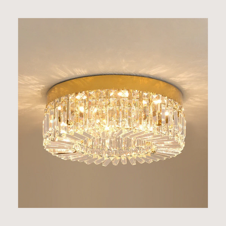 Lucent crystal flush mount chandelier lit warm on a ceiling